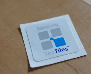 Samsung currently sells TecTiles, tags that allow for one-way communication with an NFC device. 